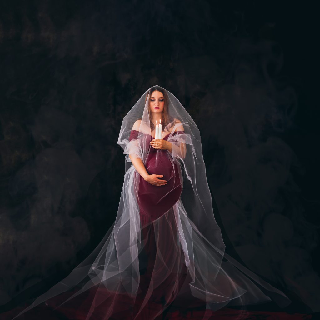 Frau Kerzen schwanger maternity schwangerschaftsshooting